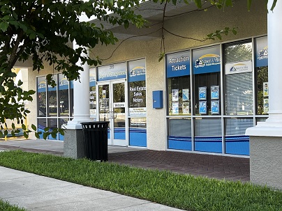 WindowCleans commercial window cleaning service at a strip mall storefront in Orlando Florida